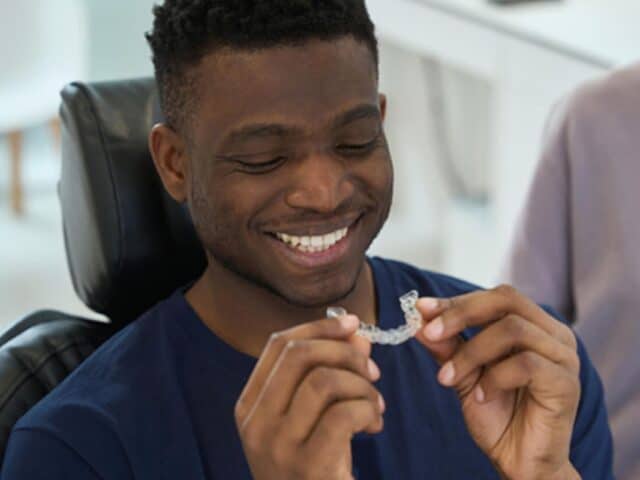 How Does Orthodontic Treatment With Invisalign Address Underbite Concerns for Adult Patients in Whitehouse?